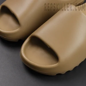 lose-up of toe area on Yeezy Slides ‘Ochre’ showing smooth upper texture