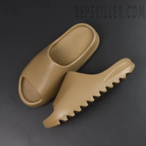 Yeezy Slides ‘Ochre’ diagonal top-down view showing inner footbed and signature logo