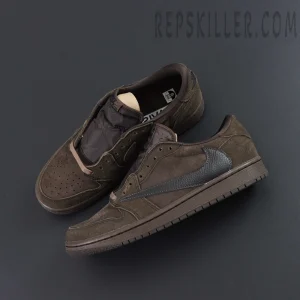 Travis Scott x Air Jordan 1 Low OG SP Velvet Brown — top-down angled view showing suede upper and reverse Swoosh.