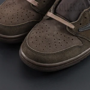 Travis Scott x Air Jordan 1 Low OG SP Velvet Brown — close-up of suede toebox texture.