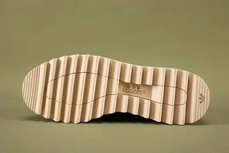 the beige outsole