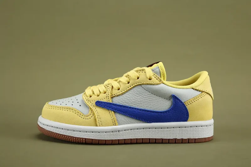 the white and yellow of KID Size Travis Scott Air Jordan 1 Canary Low