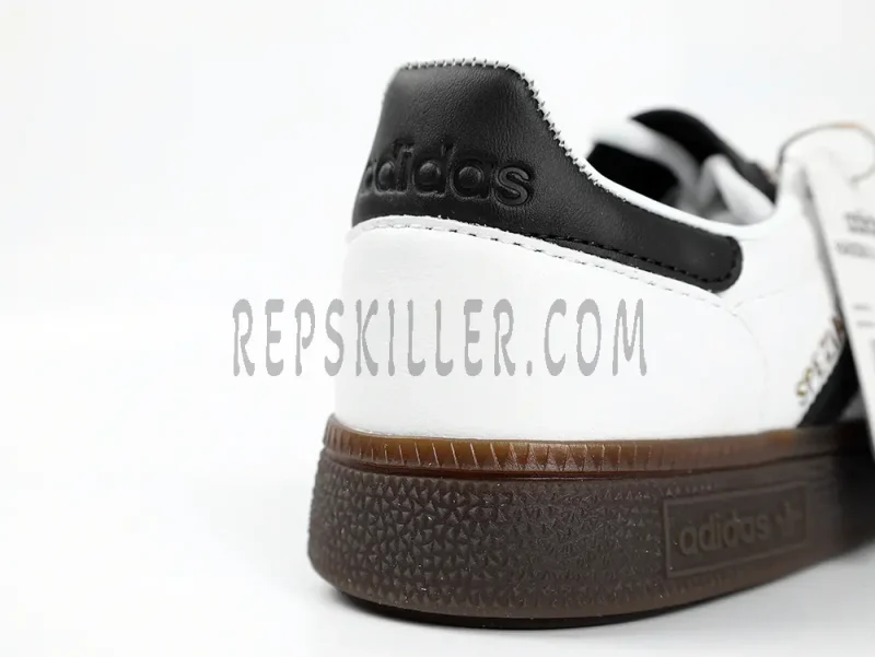 the adidas logo on the heels