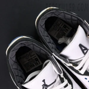 Top view of A Ma Maniére x Air Jordan 3 “For The Love” showing quilted black lining and stitched Jumpman logo.