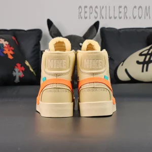 Nike Off-White x Blazer Mid ‘All Hallows Eve’ back heel view highlighting Nike text embroidery and code details.
