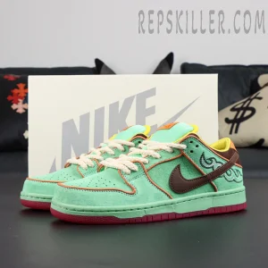 Full pair of Nike Dunk Low SB ‘Rodeo’ displayed with SB box in background, laced and angled