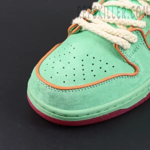 Nike Dunk Low SB ‘Rodeo’ extreme close-up of toe cap showing premium mint green suede and double-stitch details.