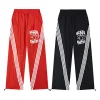 Mixed Emotion Rose Crest Track Pants (Black/Red)