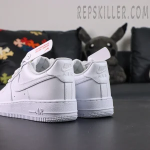 Rear angled view of Nike Air Force 1 ’07 “Triple White” showing embossed Nike Air heel logo.