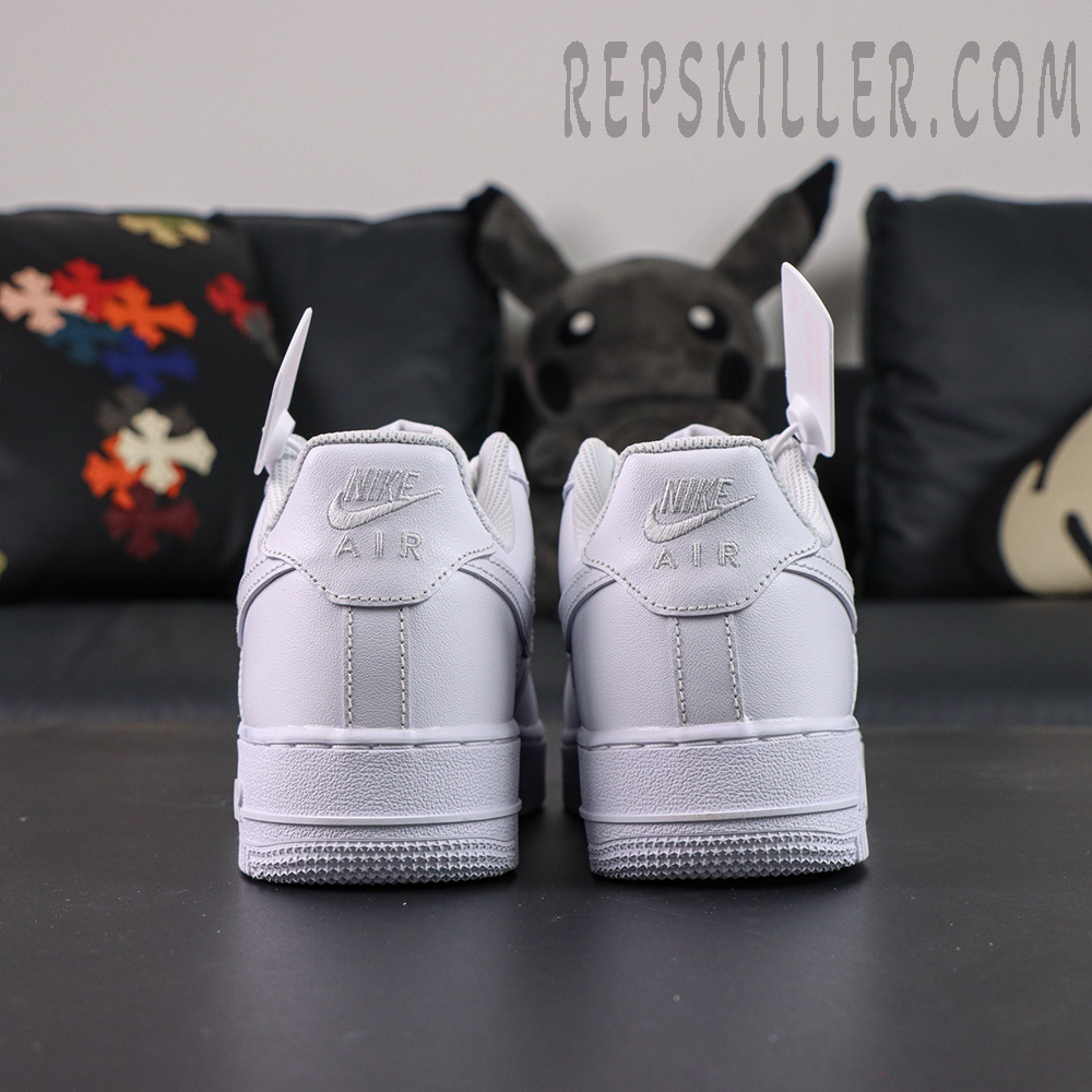 Back view of Nike Air Force 1 ’07 “Triple White” showing twin embroidered Nike Air heel tabs.