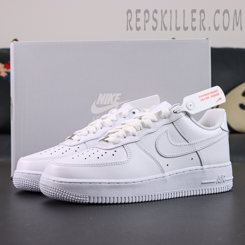 Pair of Nike Air Force 1 ’07 “Triple White” with grey box background showing minimalist design.