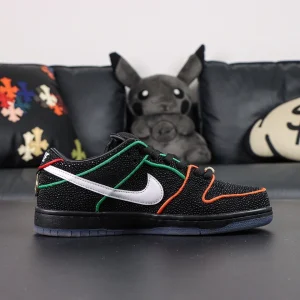 Lateral side view of Bronx Girls Skate x Nike Dunk Low SB ‘Mel & Kava’ highlighting multicolor piping and white Swoosh