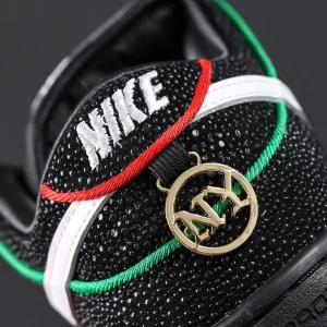 Bronx Girls Skate x Dunk Low SB ‘Mel & Kava’ heel close-up with embroidered Nike logo and gold NY charm
