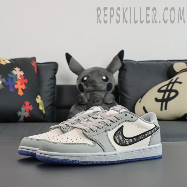Dior x Air Jordan 1 Low side profile with classic grey leather overlays and Dior Oblique Swoosh