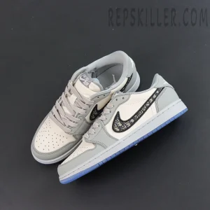Dior x Air Jordan 1 Low sneakers laid flat on black surface highlighting premium leather construction
