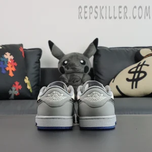 Dior x Air Jordan 1 Low rear angle focusing on sculpted grey leather heel panels with Air Dior branding
