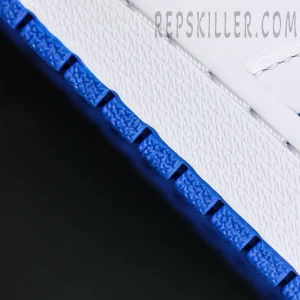 Close-up of Fragment Design x Air Jordan 1 Retro High OG blue and white outsole texture