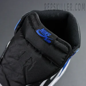 Close-up of padded black tongue with blue Nike Air logo on Fragment Design x Air Jordan 1 Retro High OG