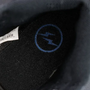 Inner sole view showing blue Fragment lightning bolt logo inside Fragment Design x Air Jordan 1 Retro High OG