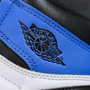 Close-up of Air Jordan Wings logo embossed on royal blue leather collar of Fragment Design x Air Jordan 1 Retro High OG
