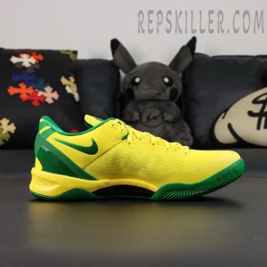 Kobe 8 Protro ‘Oregon Alternate’ PE – Medial side angle showcasing green Swoosh and streamlined yellow upper.