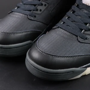 Paris Saint-Germain x Air Jordan 5 Retro ‘Off Noir’ – Close-up of textured black toe box with ripstop underlay and smooth leather overlays