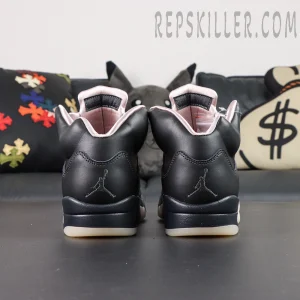 Paris Saint-Germain x Air Jordan 5 Retro ‘Off Noir’ – Straight rear view highlighting dual black Jumpman logos on heels with pink satin lining