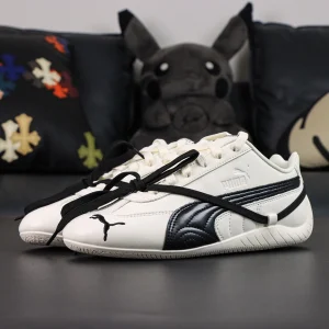 Rosé x Wmns Speedcat Premium ‘Warm White’ side view showing white upper with black Formstrip and cross-lace detail