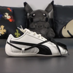 Rosé x Wmns Speedcat Premium ‘Warm White’ inner side profile highlighting smooth leather upper and stitched black Formstrip