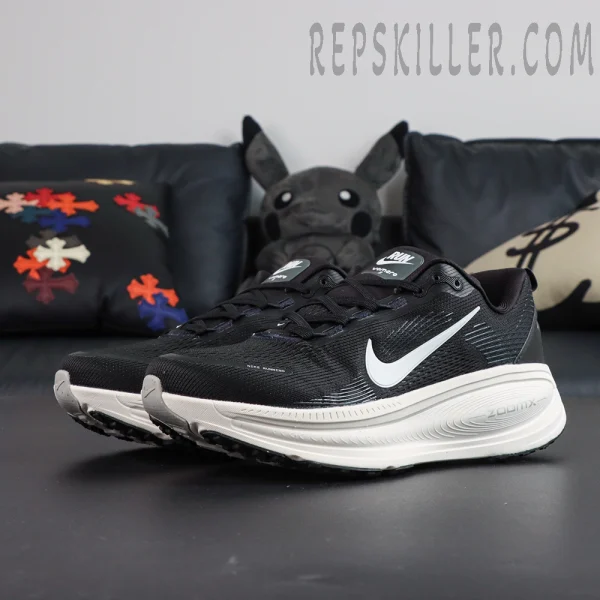 Nike Vomero 18 'Black Coconut Milk' pair front angle with visible midsole swirl