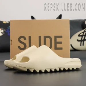 Full display of the Yeezy Slides ‘Bone’ with the box