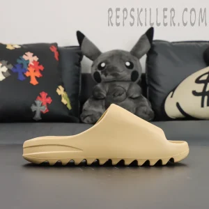 Yeezy Slides ‘Desert Sand’ Opposite Side View Highlights the other side’s balanced silhouette and cushioned midsole.