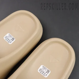 Close-up of footbed logos on Yeezy Slides ‘Pure’ 2021 Re-Release