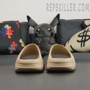 Yeezy Slides ‘Pure’ front heel-to-heel view highlighting symmetrical shape