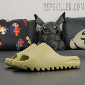 Angled view of Yeezy Slides ‘Resin’ showing ergonomic slip-on silhouette