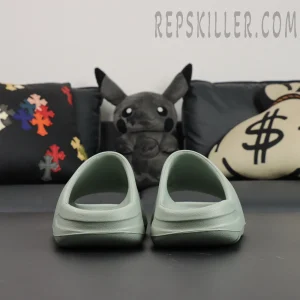 Rear view of Yeezy Slides ‘Salt’ showcasing the heel curve and minimalistic design.
