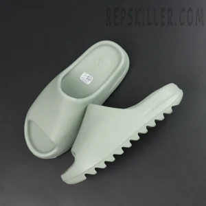 Top-down and side layout of Yeezy Slides ‘Salt’ to show overall silhouette.