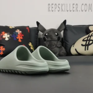 Rear diagonal angle of Yeezy Slides ‘Salt’ with dual heel curvature.