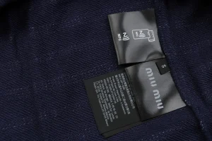 MM Striped Quarter-Zip Polo Sweatshirt Wash tag