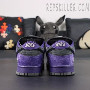 Nike Supreme x Dunk Low SB “Ink” rear heel view with bold NIKE embroidery in white over purple suede.
