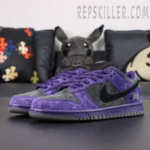 Nike Supreme x Dunk Low SB “Ink” side view showcasing purple and charcoal suede upper with black Swoosh and “94” embroidery.