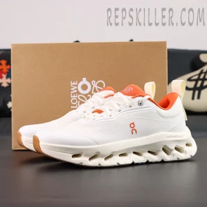 ON Loewe x Cloudtilt 2 ‘White Orange’ pair display with Loewe x On co-branded box in background.