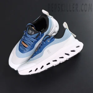 ON Loewe x Cloudtilt 2 ‘Blue White’ angled pair highlighting dynamic layering and perforated sole design.
