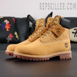 Three-quarter angle of A Bathing Ape x Undefeated x Timberland 6 Inch “Wheat” showcasing waterproof nubuck texture.