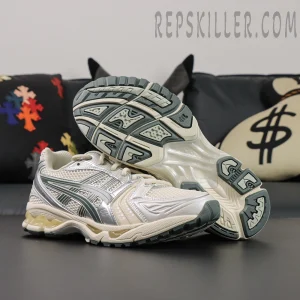 ASICS GEL-Kayano 14 “Birch Dark Pewter” outsole and side profile showing midsole cushioning and tread pattern.
