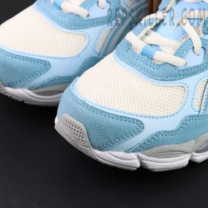 Close-up of ASICS GEL-NYC “Arctic Sky” toe box showing cream mesh and sky-blue suede detail.