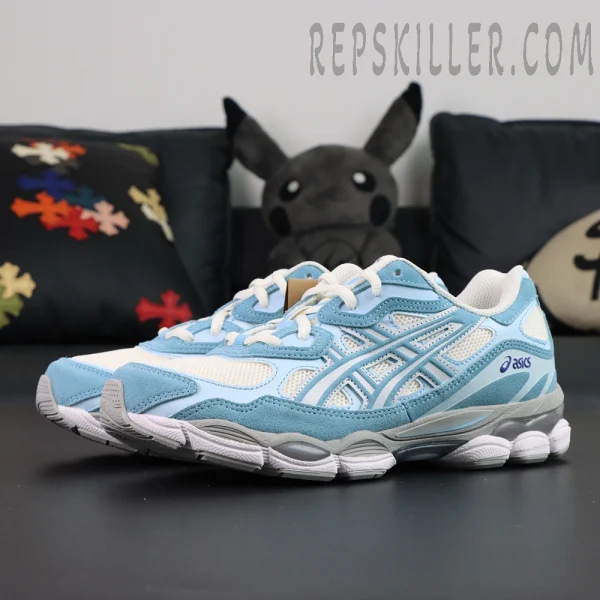 Angled front view of ASICS GEL-NYC “Arctic Sky” showing soft blue and cream tones.