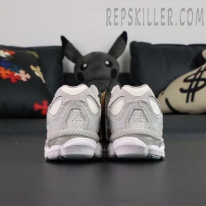 Rear view of ASICS GEL-NYC “Cream Cloud Grey” showing heel GEL cushioning and embossed branding.