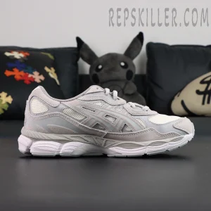 Side profile of ASICS GEL-NYC “Cream Cloud Grey” featuring layered suede and mesh construction in soft neutral tones.