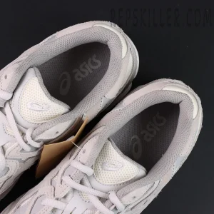 Top view of ASICS GEL-NYC “Cream Cloud Grey” revealing asics logo on insoles and padded collar design.
